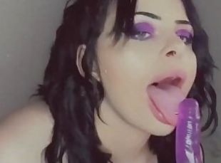 GOTH SLUT SUCKS HER PURPLE DILDO