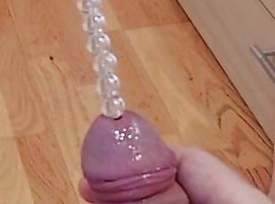 Urethral beads string insertion all the way. Cumshot through hollow urethral plug with glans ring