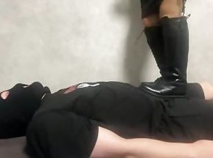 Black boots trampling