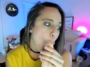 Katie from Katie's World Sucking on a Dildo