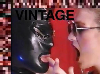 a male rubber slave has to do what his mistress orders.mp4