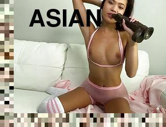 Petite asian fucks herself