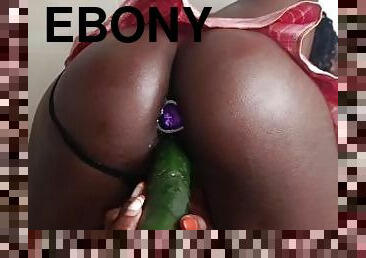 Hot Ebony Girl Fucking Herself With A Cucumber & Buttplug