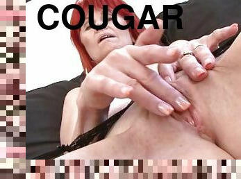 Redhead Cougar Takes A Huge Jamaican Cock On Couch