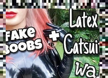 Walking in Latex Catsuit with Fake Silicone Breasts