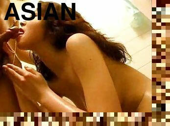 Giving a BJ in the bath like a good Asian slut