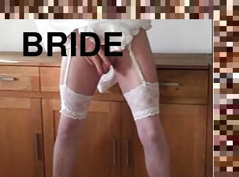 Tranny Bride fucks a dildo and pisses