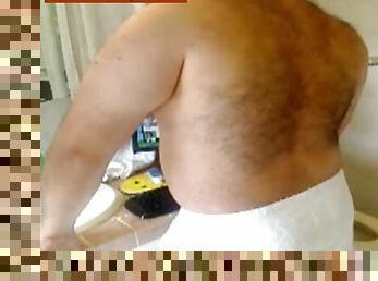 Hairy muscle bear plays with himself in the bathroom