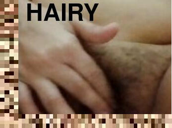 Fingering my horny hairy pussy