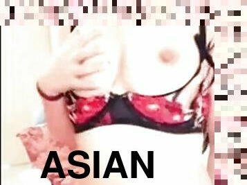 Asian girl masturbating in front of the camera until squirt