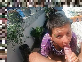 Blowjob on our terrace with some handfree sucking. Cum in mouth & swallow.