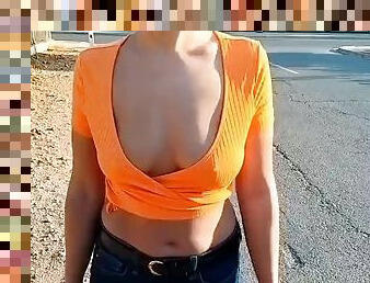 Shows her tits in the city center