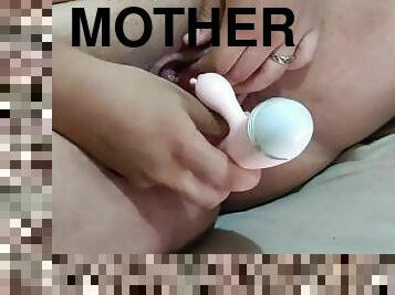 My stepmother masturbates with her vibrator