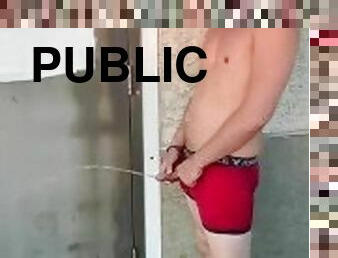 2 guys pissing in public