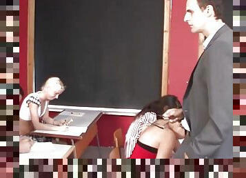 Brunette teen penetrated on the school desk by the teacher