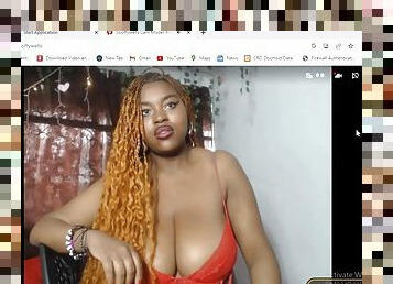 Ebony with big tits has fun on webcam