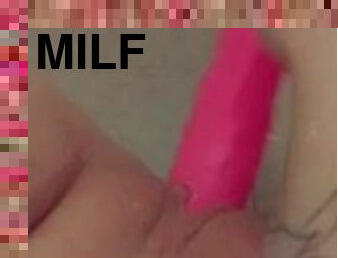 Milf playing with her hot pink dildo