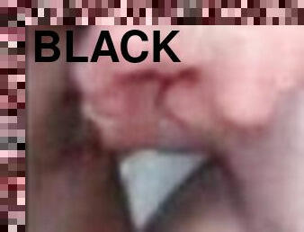 She moans as her sexy black pussy lips swallow the big white hammer