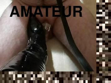 Stepping on cock in chastity with boots