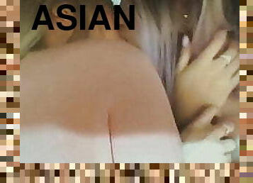 Two sexy Asian chick kissing 