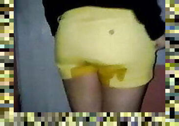Latina in Yellow Shorts