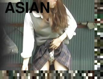 Teen asian pees outside