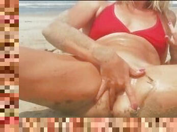 Hot blonde fingering both holes with oil on the beach - Angel Fowler