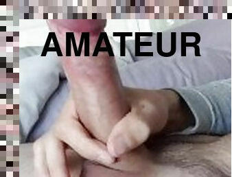 Stroking hard cock leads to powerful cumshot