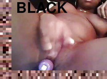Black girl fucks pussy with toy and fingers clit