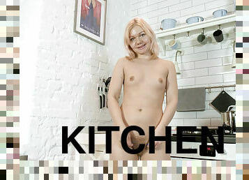 Gerda Lu wears pink as she plays in her kitchen - WeAreHairy