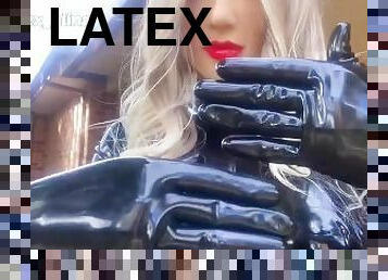 Real Rubber Doll Playing With Shiny Latex Gloves