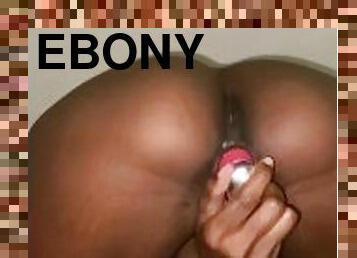 Ebony bent over with Dildo