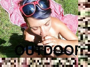 Outdoor blowjob with sunbathing girlfriend