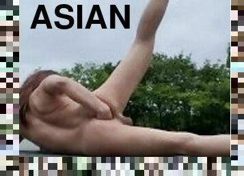 Asian Ladyboy LauranQ teasing herself outside
