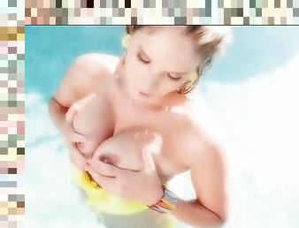 Bikini girl Eva Parcker fondles her tits in the pool