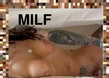TATTED MILF FUCKS HERSELF WITH A SHOWER HEAD AT A PUBLIC POOL !!!