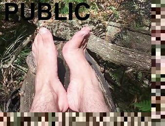 In the deep bush land where no one goes is a man playing with his extra long toes - MANLYFOOT