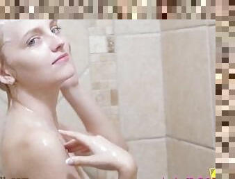 Skinny Blonde takes sexy shower & shows Teen pussy
