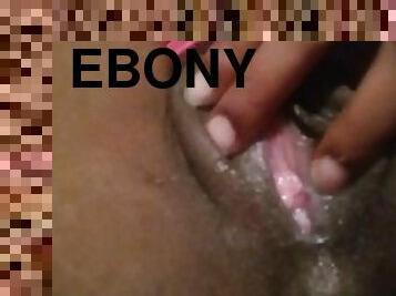 Ebony slut touches herself