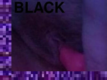 Purple toy and black light