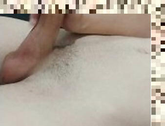 boy masturbates with soft cock during the day