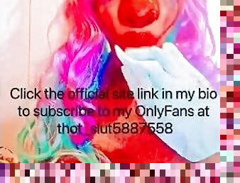 Sexy CLOWN sucking on a banana and playing with her tits