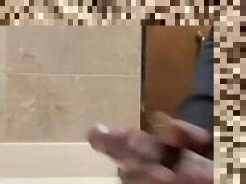 Huge cumshot in public bathroom