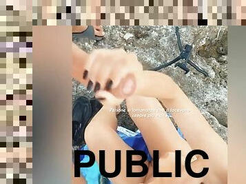 Masturbating on a public beach ends up jerking off to a stranger