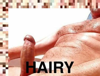 hairy muscle daddy flashing dick on a pool