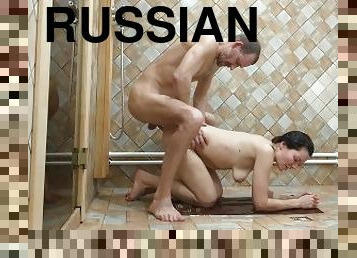 Russian MILF fucks in the bath