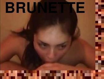 Brunette slut sucking a big dick