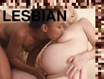 Aroused interracial lesbian couple exploring 69 pleasures together