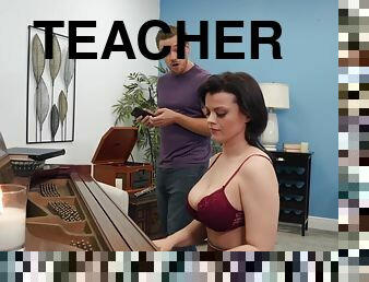 A piano teacher with big soft tits gets her mature pussy drilled