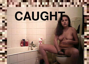 Sweet brunette gets caught by camera in bathroom